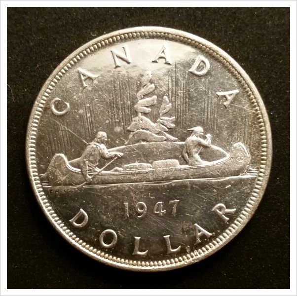 1947-Pointed-7-Canadian-Dollar